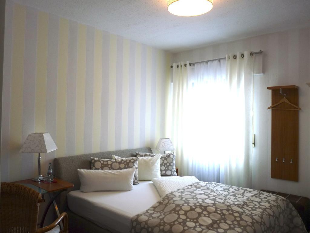 Hotel Geissler Estugarda Quarto foto