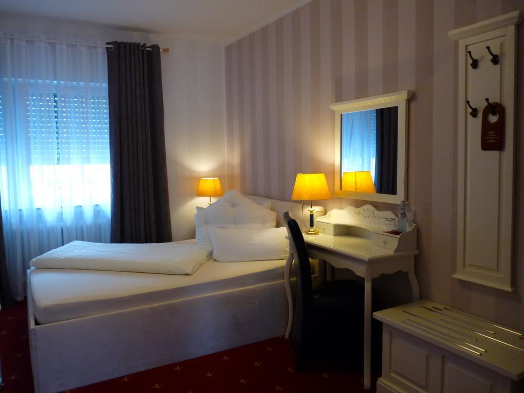 Hotel Geissler Estugarda Quarto foto